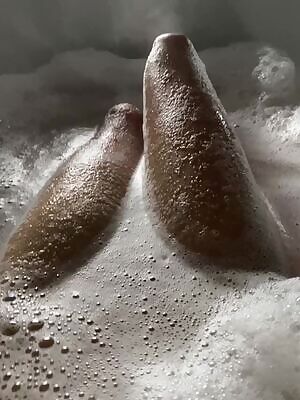 Having a bath and showing my legs to you...
