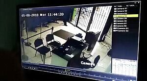 Two robbers enter a bank, kill one guard then get shot by another security guy