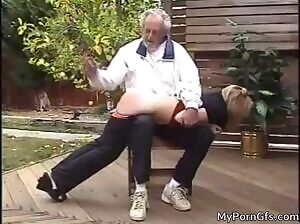 Rubbing her spanked bottom