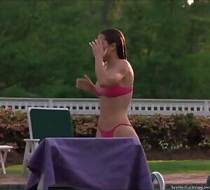 Jessica Biel wringing out her hair