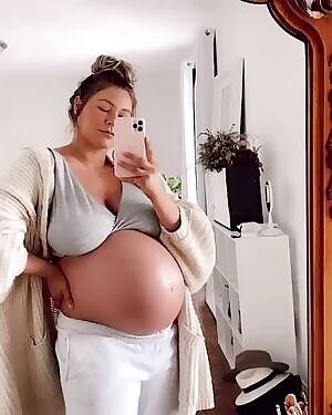 Love those tits hanging on that big belly