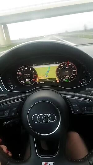 Driving her Audi