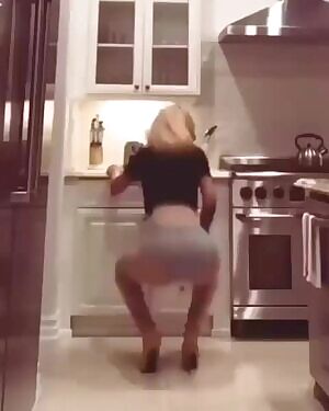 In the kitchen with heals on