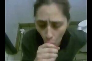 Fast-food manager giving her employee some head in the bathroom. Doesn't like the special sauce