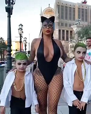 Mother taking children to Halloween party at school