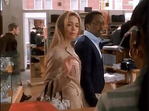 Denise Richards sly look to a black woman.