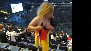 Hot blonde flashing in stadium
