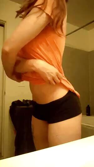 Stripping off an orange shirt