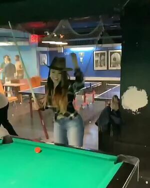 Asian chick fills out her jeans quite well...