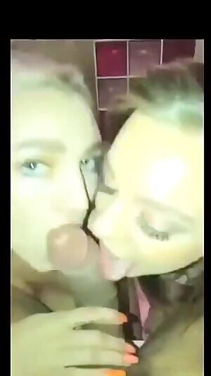 Kendra Sunderland and friend sharing a cock.