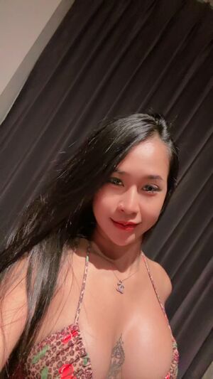 An Asian girl loves to sing.
