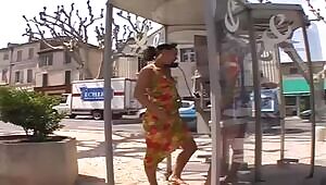 Pissing at a phonebooth