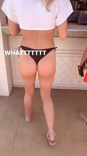 dancing and slapping her ass
