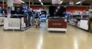 Trashy chick casually pisses on a TV inside an electronicsstore and walks off