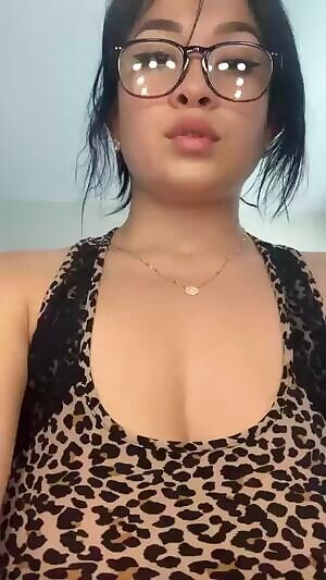 Revealing her huge titties