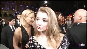 Natalie Dormer & Jennifer Lawrence with an accidental kiss at the The Hunger Games London premiere