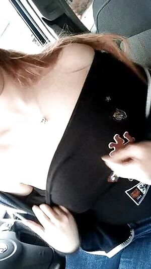 Revealing and squeezing her tits