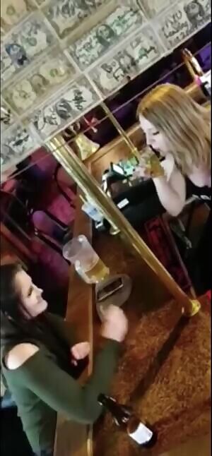 Blonde and brunette making out