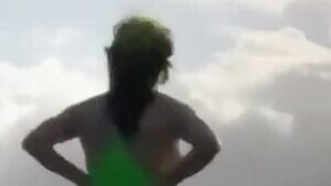 Billie Eilish with the boobs so massive you can see them from behind