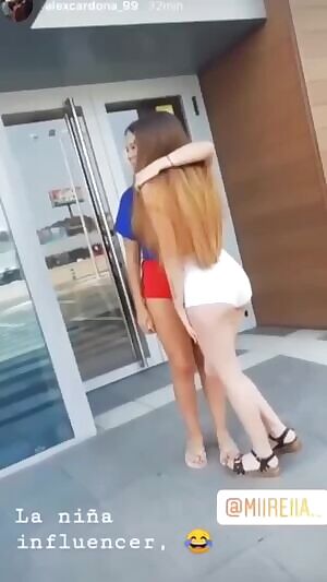 IG thot taking photos with her fans in tiny booty shorts