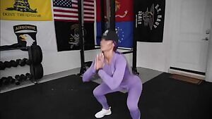 Natalie Eva Marie squatting