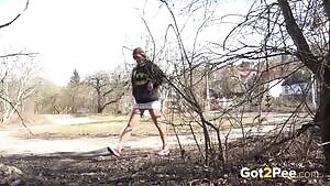 Redhead hottie Chrissy Fox relieving her pee desperation standing