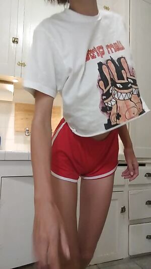 Woman with a perfect body changing outfits