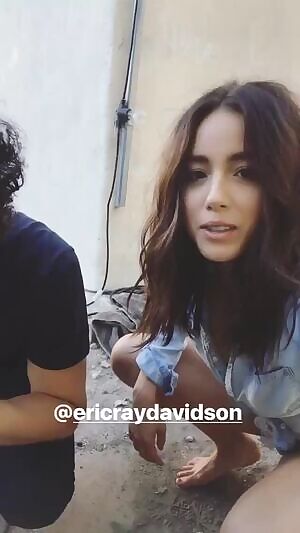 Chloe Bennet - Down shirt, no bra, quick slip