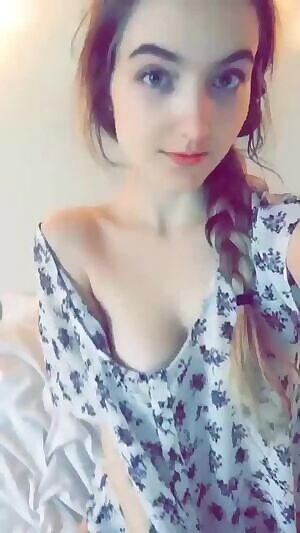 Smiling.