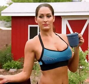 Nikki Bella pouring water on herself