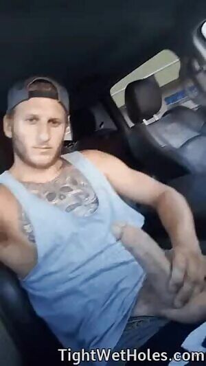 Playing with my massive cock in the car