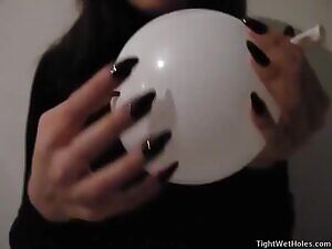 Balloon play with long natural sharp nails