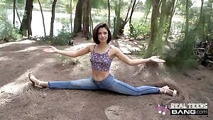 Flashing her titties while doing the splits