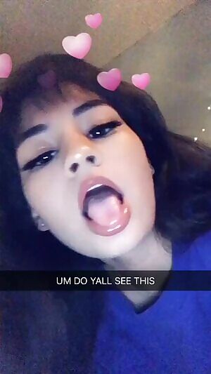 Showing off her new lip gloss