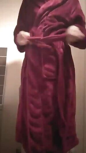 Girl takes off the bathrobe