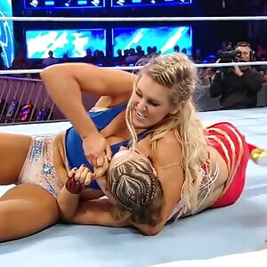 Ronda desperately trying to avoid getting smothered by Charlotte