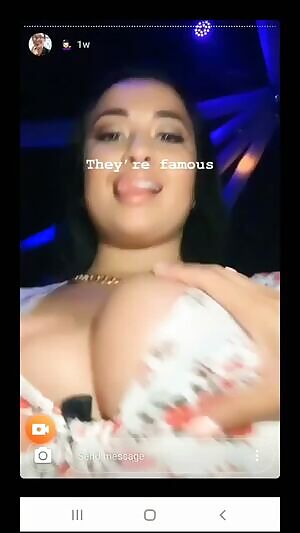 Grabbing her tits