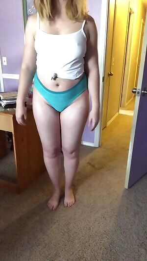 Blue panties and white tank.