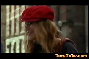 Ashley Olsen kissing Mary-Kate Olsen's feet after she sticks them in her face