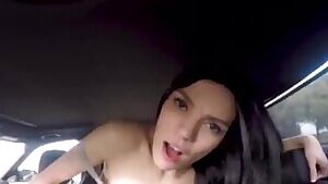 Sadie Blake in the backseat of the car.