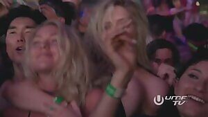 Tits bouncing out at music festival
