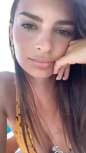Emily Ratajkowski loves getting played around with