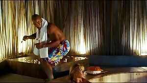 Jaime Pressly in a hot tub in DOA