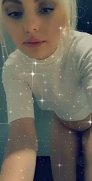 Petite blondie taking it off