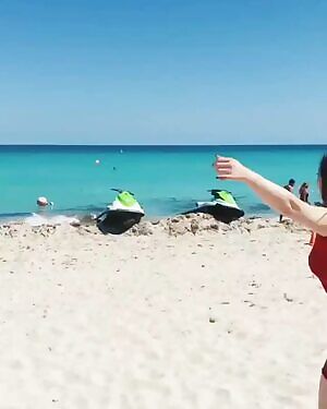 Thick Asian chick on the beach