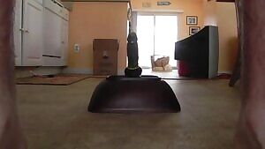 Riding the dildo with a rock hard cock