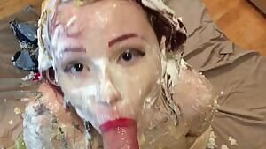 Girl with really pretty eyes with dessert all over her, deep throating