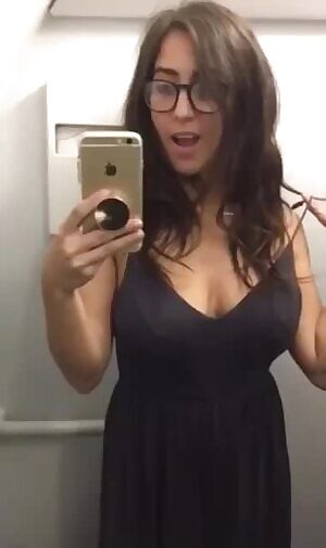 Girl shows her tits in the plane
