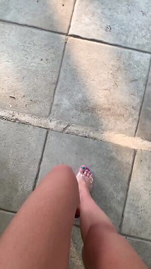 Walking in purple platform pleaser heels