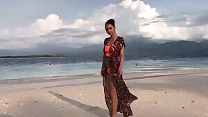 Wearing Orange in the beach